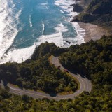 drone shot of coast road