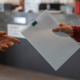 handing over a document