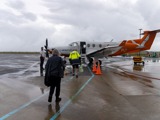 Airport passengers boarding flight