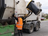 recycling truck picking up bin